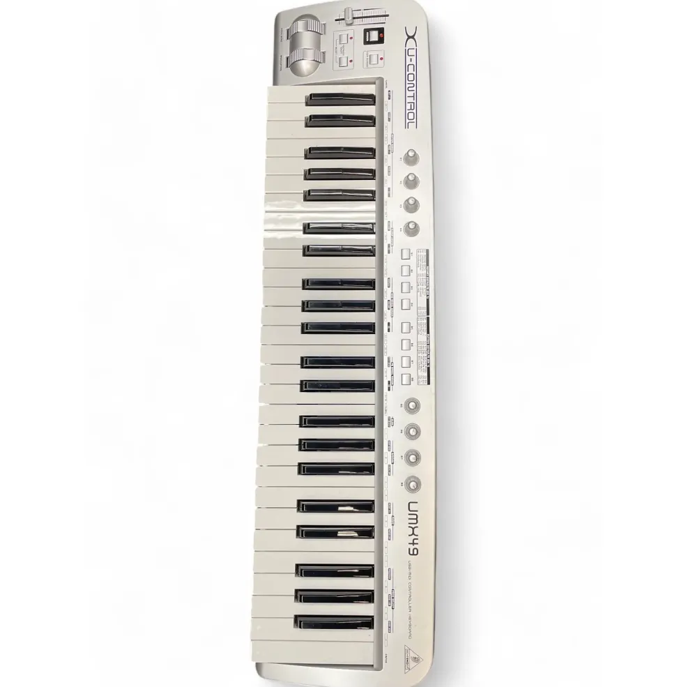 Used Behringer UMX49 49-Key USB MIDI Controller